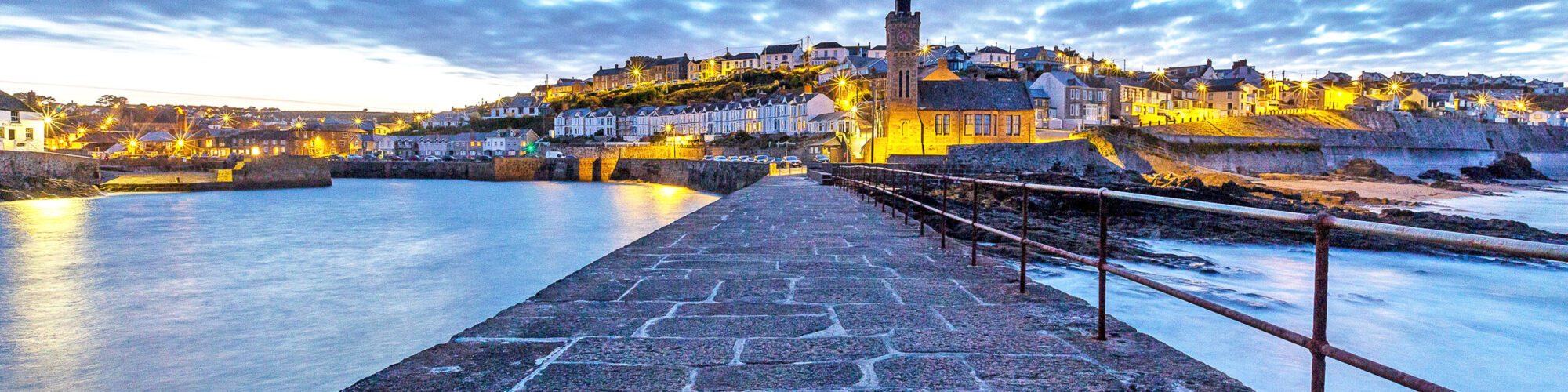 porthleven view from the pier at sunset